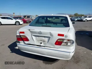 2002 Mercedes-Benz E-Class with VIN WDBJF82J62X076581, listed as a IAAI auction lot 41194976 with 235,453 mi miles. Bid and sale history available at carsss.com. Image 16.