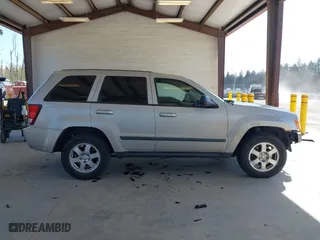 2008 Jeep Grand Cherokee Laredo with VIN 1J8GR48K18C222454, listed as a IAAI auction lot 42047541 with 180,145 mi miles. Bid and sale history available at carsss.com. Image 14.