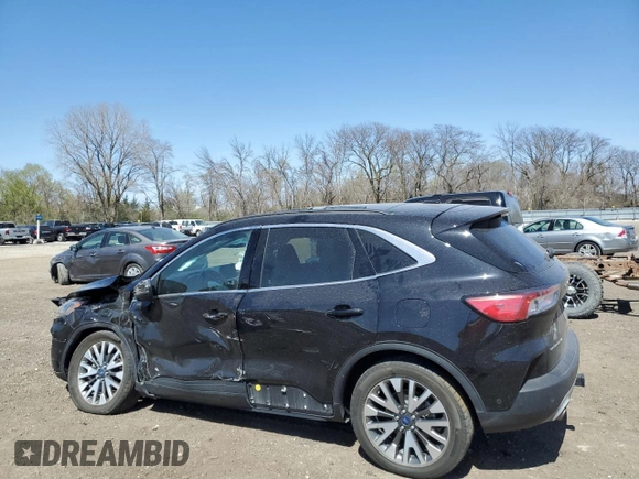 2020 Ford Escape Titanium with VIN 1FMCU9J97LUA55895, listed as a Copart auction lot 53058785 with 70,988 mi miles and Salvage title. Bid and sale history available at DreamBid. Image 2.
