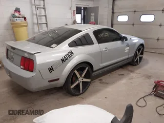 2007 Ford Mustang Deluxe with VIN 1ZVFT80N275299092, listed as a IAAI auction lot 41843625 with 176,599 mi miles. Bid and sale history available at carsss.com. Image 4.