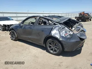 2024 Tesla Model Y z VIN 7SAYGDED6RF204899, wystawiony jako Copart lot #65517855 z przebiegiem Nie podano mil oraz Czysty tytuł • Clean title. Historia ofert i sprzedaży dostępna na DreamBid. Obrazek 2.