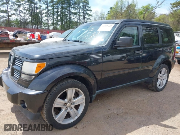 2011 Dodge Nitro Heat with VIN 1D4PT4GX2BW554188, listed as a IAAI auction lot 41882423 with 167,039 mi miles and . Bid and sale history available at DreamBid. Image 2.
