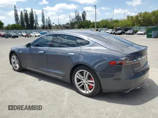 2014 Tesla Model S 60 with VIN 5YJSA1S13EFP63432, listed as a Copart auction lot 56706195 with 114,671 mi miles and Clean Title. Bid and sale history available at DreamBid. Image 2.