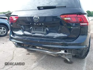 2023 Volkswagen Tiguan SE with VIN 3VVMB7AXXPM003447, listed as a IAAI auction lot 42566061 with 39,185 mi miles and . Bid and sale history available at DreamBid. Image 6.