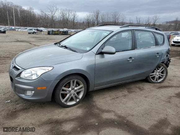 2010 Hyundai Elantra Touring GLS with VIN KMHDC8AE7AU061286, listed as a Copart auction lot 47697785 with 205,128 mi miles and Salvage Title. Bid and sale history available at carsss.com. Image 1.