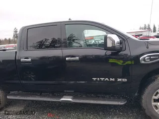 2016 Nissan Titan XD Platinum Reserve with VIN 1N6BA1F2XGN502660, listed as a IAAI auction lot 41731577 with 118,581 mi miles. Bid and sale history available at carsss.com. Image 13.