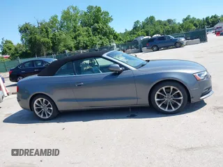 2014 Audi A5 Premium Plus z VIN WAULFAFH0EN003941, wystawiony jako IAAI lot #42406249 z przebiegiem 120 501 mil mil oraz . Historia ofert i sprzedaży dostępna na DreamBid. Obrazek 13.