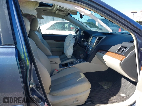 2014 Subaru Outback 2.5i Limited with VIN 4S4BRCNC3E3238624, listed as a IAAI auction lot 41692100 with 128,759 mi miles. Bid and sale history available at carsss.com. Image 5.