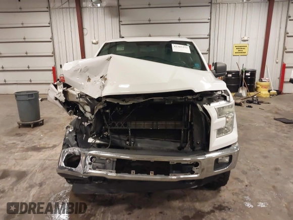 2015 Ford F-150 XLT with VIN 1FTEW1EF2FKF21984, listed as a IAAI auction lot 42385273 with 103,721 mi miles and . Bid and sale history available at DreamBid. Image 13.