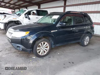2013 Subaru Forester X Premium with VIN JF2SHADC2DH414921, listed as a IAAI auction lot 42660640 with 164,017 mi miles and . Bid and sale history available at DreamBid. Image 2.