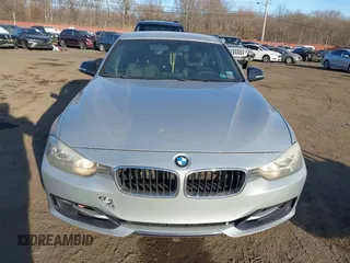 2013 BMW 3 Series 328i xDrive with VIN WBA3B3C56DF540744, listed as a IAAI auction lot 41433347 with 162,328 mi miles and . Bid and sale history available at DreamBid. Image 12.