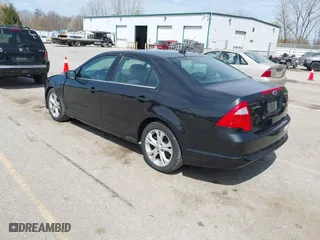 2012 Ford Fusion SE with VIN 3FAHP0HA8CR276237, listed as a IAAI auction lot 42048715 with 1,799,668 mi miles. Bid and sale history available at carsss.com. Image 3.