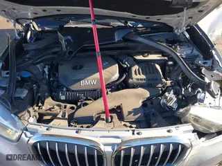 2018 BMW X1 xDrive28i with VIN WBXHT3C36J5L33781, listed as a IAAI auction lot 41497360 with 61,251 mi miles. Bid and sale history available at carsss.com. Image 10.
