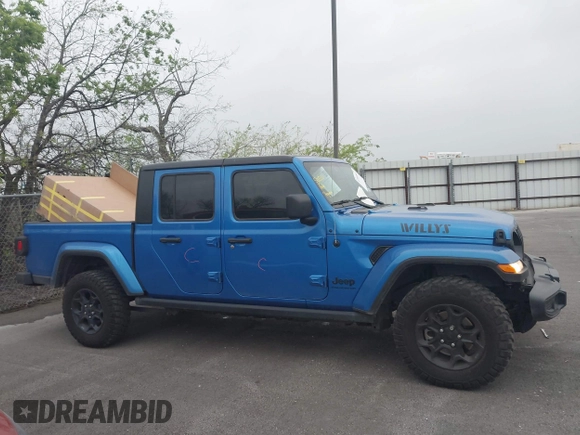 2023 Jeep Gladiator Sport S z VIN 1C6HJTAG6PL579136, wystawiony jako IAAI lot #41946641 z przebiegiem 14 856 mil mil oraz . Historia ofert i sprzedaży dostępna na DreamBid. Obrazek 13.