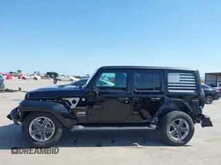 2023 Jeep Wrangler Sahara with VIN 1C4HJXEN5PW508257, listed as a IAAI auction lot 42007569 with 34,990 mi miles and . Bid and sale history available at DreamBid. Image 14.