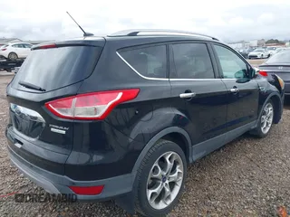 2016 Ford Escape Titanium with VIN 1FMCU0JX8GUA49619, listed as a IAAI auction lot 41743116 with 53,456 mi miles. Bid and sale history available at carsss.com. Image 4.