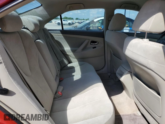 2009 Toyota Camry LE z VIN 4T1BK46K69U085964, wystawiony jako Copart lot #56180855 z przebiegiem 149 184 mil mil oraz Szkoda całkowita • Salvage title. Historia ofert i sprzedaży dostępna na DreamBid. Obrazek 10.
