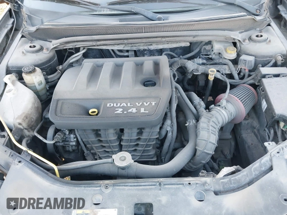 2014 Dodge Avenger SE with VIN 1C3CDZABXEN144000, listed as a IAAI auction lot 41878635 with 153,097 mi miles and . Bid and sale history available at DreamBid. Image 10.