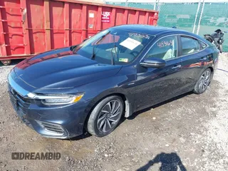 2020 Honda Insight Touring with VIN 19XZE4F90LE005829, listed as a IAAI auction lot 41531631 with 29,758 mi miles and . Bid and sale history available at carsss.com. Image 2.