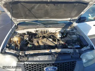 2005 Ford Escape XLT with VIN 1FMYU931X5KA84738, listed as a IAAI auction lot 41663564 with 140,903 mi miles. Bid and sale history available at carsss.com. Image 10.
