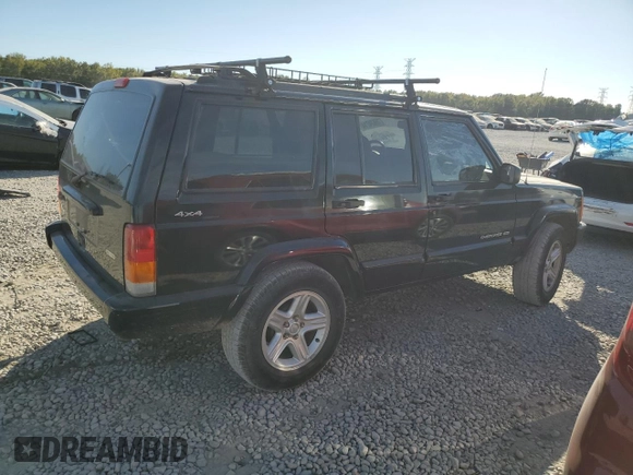 2001 Jeep Cherokee Sport z VIN 1J4FF58S61L612533, wystawiony jako Copart lot #76824714 z przebiegiem 62 401 mil mil oraz Szkoda całkowita • Salvage title. Historia ofert i sprzedaży dostępna na DreamBid. Obrazek 3.