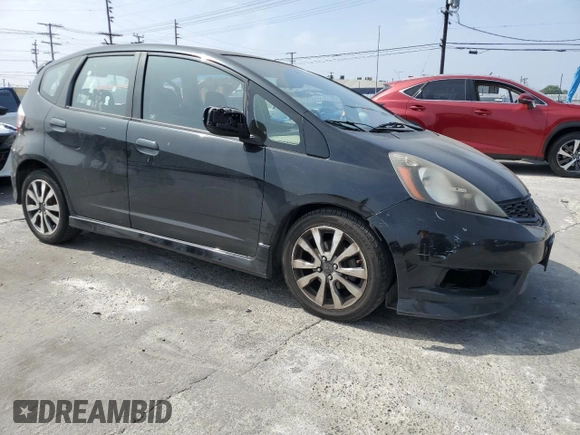 2012 Honda Fit Sport with VIN JHMGE8H5XCC006016, listed as a Copart auction lot 52941995 with 196,312 mi miles and Salvage Title. Bid and sale history available at carsss.com. Image 4.