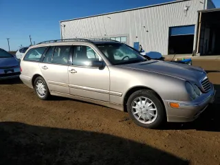 2000 Mercedes-Benz E-Class with VIN WDBJH65J6YB012332, listed as a Copart auction lot 80918284 with 186,616 mi miles and Clean Title. Bid and sale history available at carsss.com. Image 4.