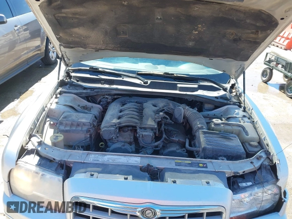 2006 Chrysler 300 Touring with VIN 2C3KA53G96H109576, listed as a IAAI auction lot 41837473 with 149,438 mi miles. Bid and sale history available at carsss.com. Image 10.