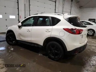 2014 Mazda CX-5 Grand Touring with VIN JM3KE4DY9E0343616, listed as a Copart auction lot 46427715 with 205,325 mi miles and Salvage Title. Bid and sale history available at carsss.com. Image 2.