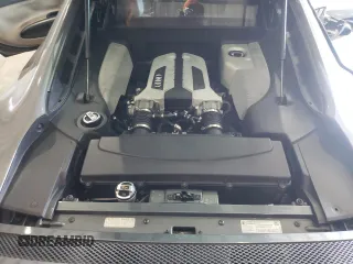 2009 Audi R8 4.2L z VIN WUAAU34279N002238, wystawiony jako Copart lot #74154804 z przebiegiem 71 425 mil mil oraz Szkoda całkowita • Salvage title. Historia ofert i sprzedaży dostępna na DreamBid. Obrazek 12.