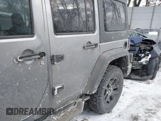 2014 Jeep Wrangler Unlimited Sport with VIN 1C4HJWDG1EL302087, listed as a IAAI auction lot 41420740 with 152,096 mi miles. Bid and sale history available at carsss.com. Image 20.