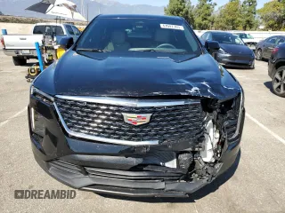 2024 Cadillac XT4 FWD Luxury with VIN 1GYAZAR46RF222794, listed as a Copart auction lot 47047765 with 0 mi miles and Salvage Title. Bid and sale history available at carsss.com. Image 5.