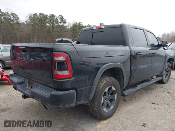 2019 Ram 1500 Rebel z VIN 1C6SRFLT1KN722064, wystawiony jako IAAI lot #41513201 z przebiegiem 113 559 mil mil oraz . Historia ofert i sprzedaży dostępna na DreamBid. Obrazek 4.