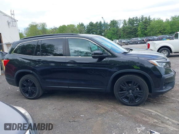 2022 Honda Pilot Special Edition z VIN 5FNYF6H27NB005196, wystawiony jako IAAI lot #42297439 z przebiegiem 43 478 mil mil oraz . Historia ofert i sprzedaży dostępna na DreamBid. Obrazek 13.