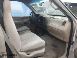 1998 Ford F-150 Standard with VIN 1FTZX18W6WKA83626, listed as a IAAI auction lot 40625179 with 343,403 mi miles. Bid and sale history available at carsss.com. Image 5.