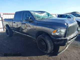 2016 Ram 2500 Tradesman z VIN 3C6UR5CL1GG222232, wystawiony jako IAAI lot #41666775 z przebiegiem 140 657 mil mil oraz . Historia ofert i sprzedaży dostępna na DreamBid. Obrazek 1.