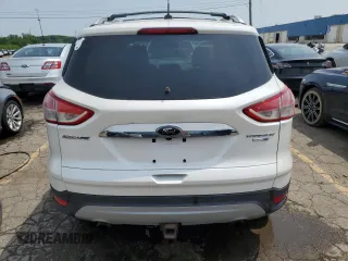 2015 Ford Escape Titanium с VIN 1FMCU9J95FUC87156, выставлен на аукционе Copart как лот 60097165 с пробегом 111 275 миль миль и Списание • Salvage title. История ставок и продаж доступна на DreamBid. Изображение 6.