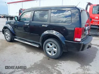 2007 Dodge Nitro SLT with VIN 1D8GU58K97W679278, listed as a IAAI auction lot 42014211 with 213,451 mi miles and . Bid and sale history available at carsss.com. Image 3.