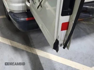 2010 Ford Econoline Cargo Commercial with VIN 1FTNE1EW1ADA90764, listed as a IAAI auction lot 42608095 with 146,335 mi miles and . Bid and sale history available at DreamBid. Image 23.