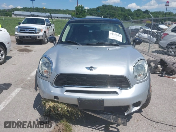 2011 MINI Countryman S with VIN WMWZC5C53BWL53641, listed as a IAAI auction lot 42547084 with 171,647 mi miles and . Bid and sale history available at DreamBid. Image 12.