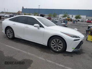 2022 Toyota Mirai XLE z VIN JTDAAAAA2NA007211, wystawiony jako IAAI lot #41473368 z przebiegiem 31 491 mil mil oraz . Historia ofert i sprzedaży dostępna na DreamBid. Obrazek 1.