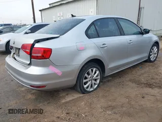 2015 Volkswagen Jetta Sport with VIN 3VWD17AJ5FM307746, listed as a IAAI auction lot 41506413 with 113,297 mi miles and . Bid and sale history available at DreamBid. Image 4.