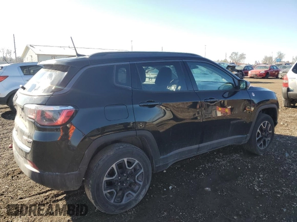 2019 Jeep Compass Trailhawk with VIN 3C4NJDDB1KT727756, listed as a Copart auction lot 42439055 with 104,525 mi miles and Salvage Title. Bid and sale history available at carsss.com. Image 3.