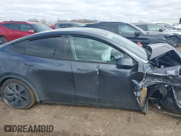 2025 Tesla Model Y Long Range with VIN 7SAYGDED3SF229605, listed as a IAAI auction lot 41726254 with Not Provided miles and . Bid and sale history available at DreamBid. Image 12.