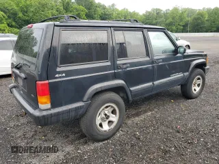 1999 Jeep Cherokee Sport with VIN 1J4FF68S8XL671341, listed as a Copart auction lot 58136475 with 139,848 mi miles and Salvage title. Bid and sale history available at DreamBid. Image 3.