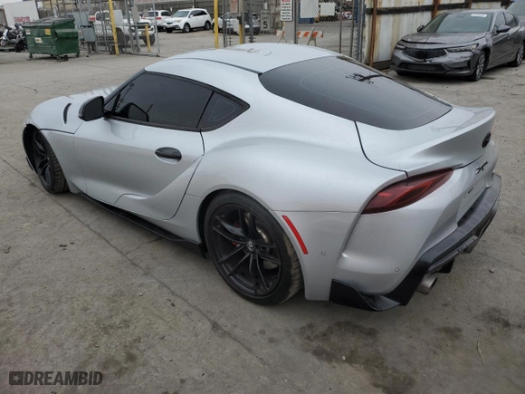 2021 Toyota GR Supra 3.0 with VIN WZ1DB0C0XMW039660, listed as a Copart auction lot 86909354 with 30,272 mi miles and Salvage Title. Bid and sale history available at carsss.com. Image 2.