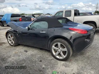 2006 Pontiac Solstice z VIN 1G2MB33B96Y101269, wystawiony jako Copart lot #70323934 z przebiegiem 85 038 mil mil oraz Szkoda całkowita • Salvage title. Historia ofert i sprzedaży dostępna na DreamBid. Obrazek 2.