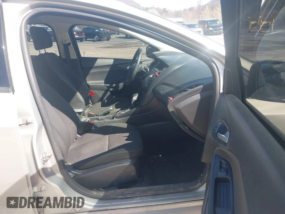 2015 Ford Focus SE with VIN 1FADP3F24FL260387, listed as a IAAI auction lot 41990194 with 80,673 mi miles. Bid and sale history available at carsss.com. Image 5.