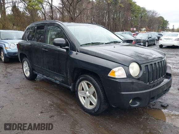 2008 Jeep Compass Sport with VIN 1J8FT47028D725448, listed as a IAAI auction lot 41972561 with 198,524 mi miles. Bid and sale history available at carsss.com. Image 1.