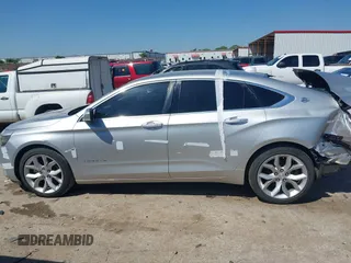 2014 Chevrolet Impala LT with VIN 2G1125S35E9102161, listed as a IAAI auction lot 41976891 with 129,408 mi miles and . Bid and sale history available at DreamBid. Image 15.